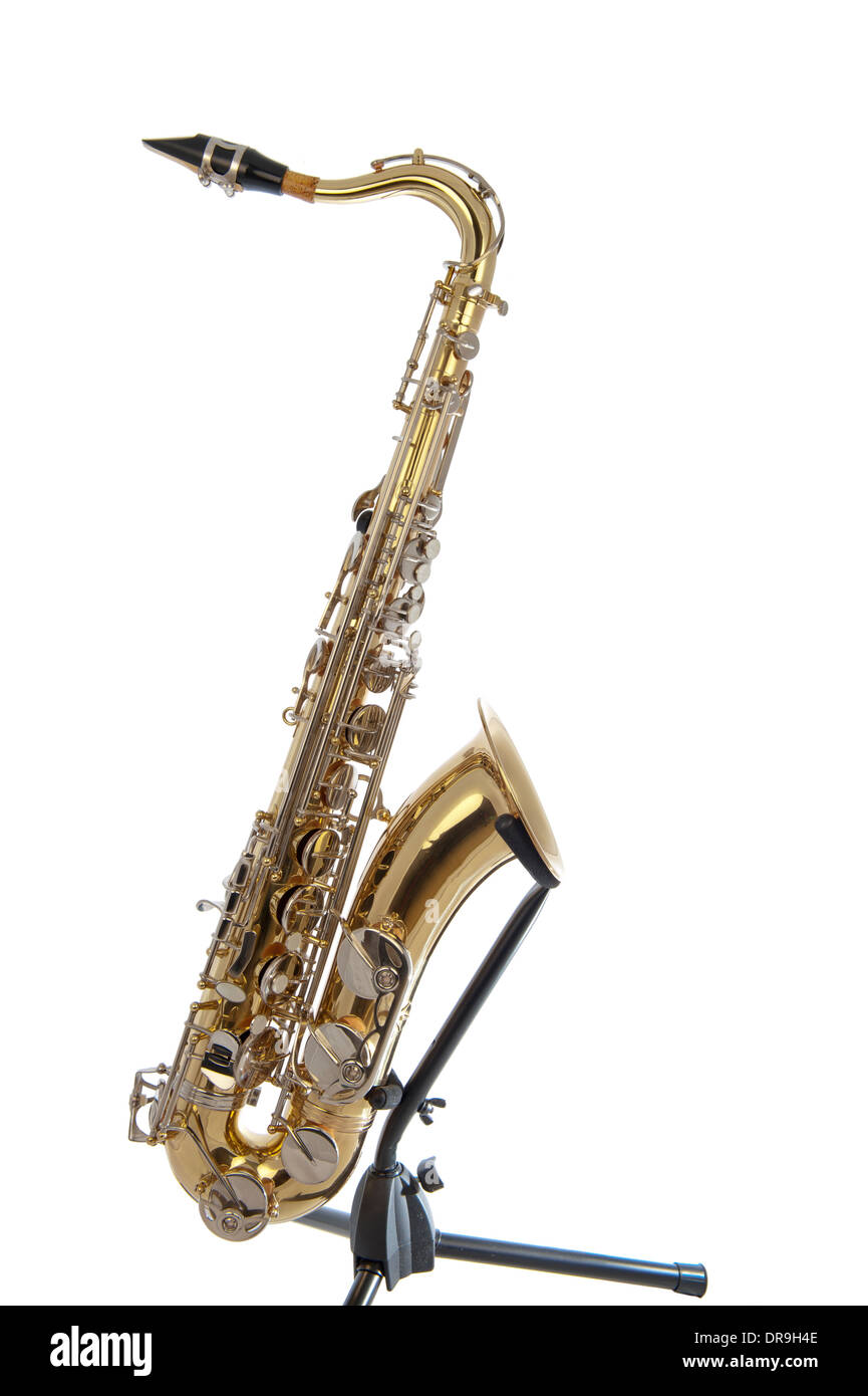 Brass tenor saxophone with silver valves and pearl buttons on a stand isolated in white Stock Photo