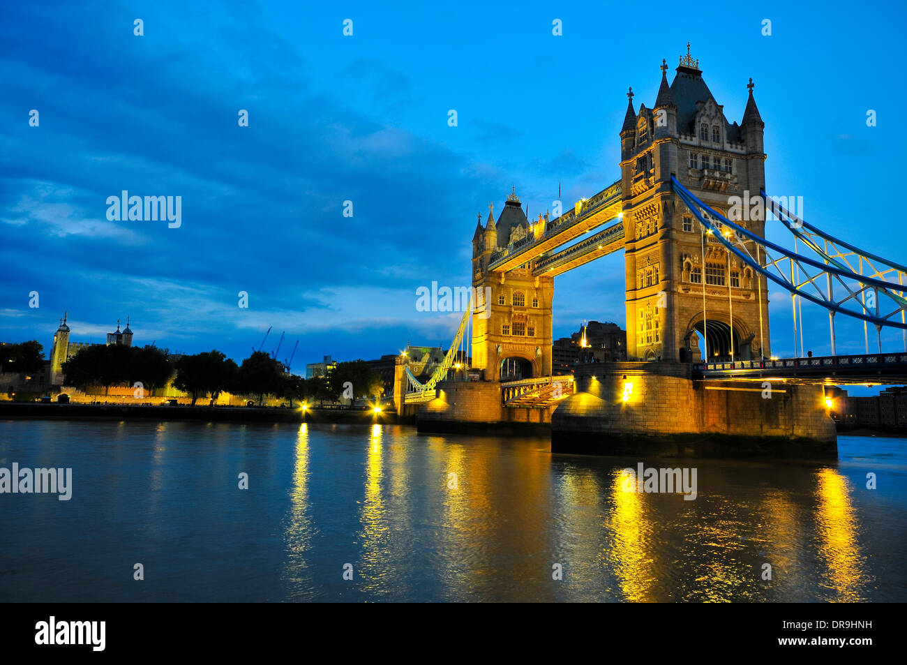 Illuminated London Bridge at night Stock Photo