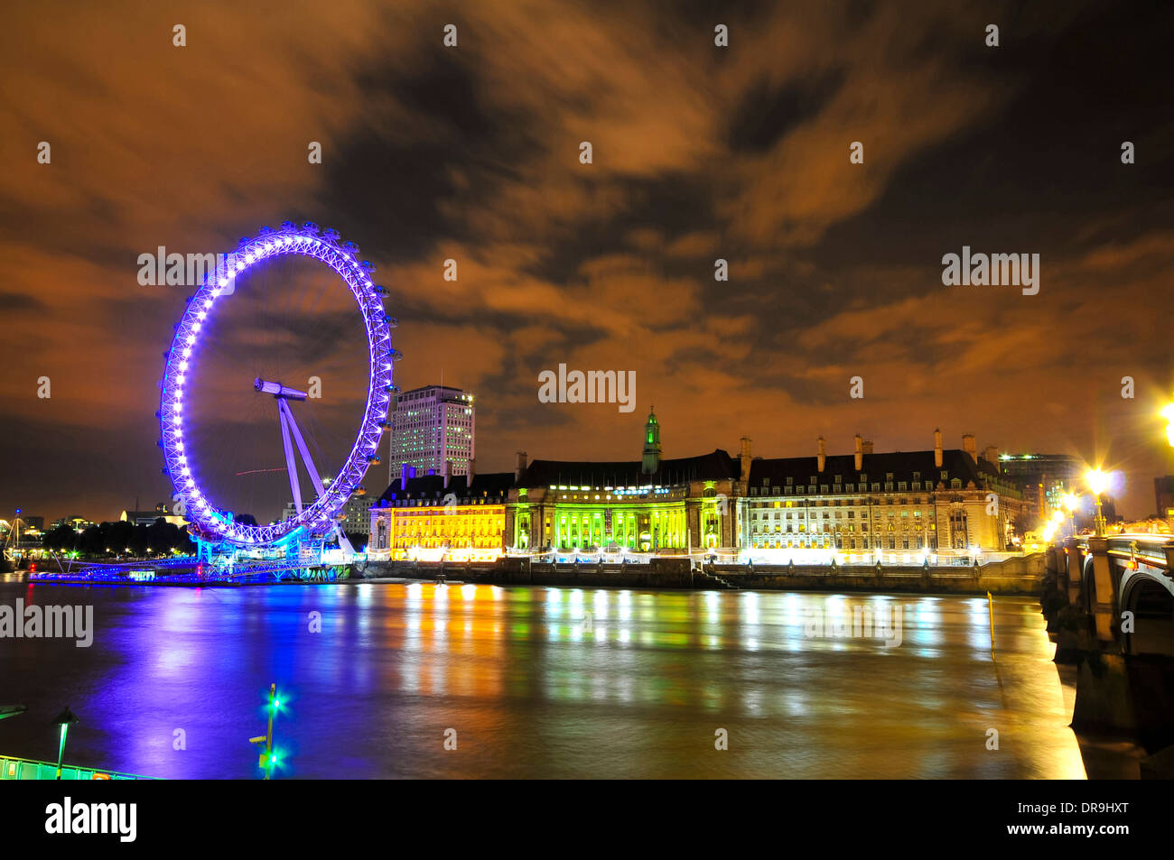 London Eye and Thames River at night Stock Photo