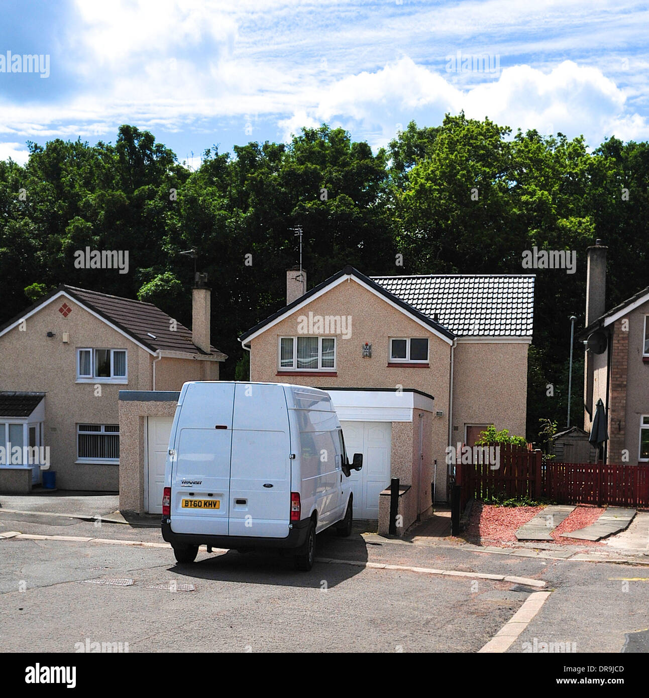 Police are searching the garden and garage area of a House in Annan