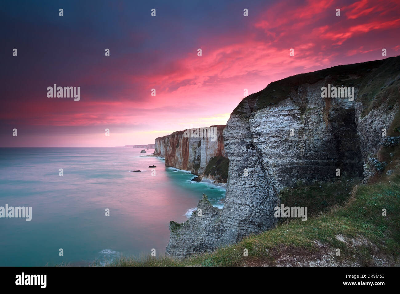 dramatic sunrise over cliffs in Atlantic ocean, Etretat, France Stock ...