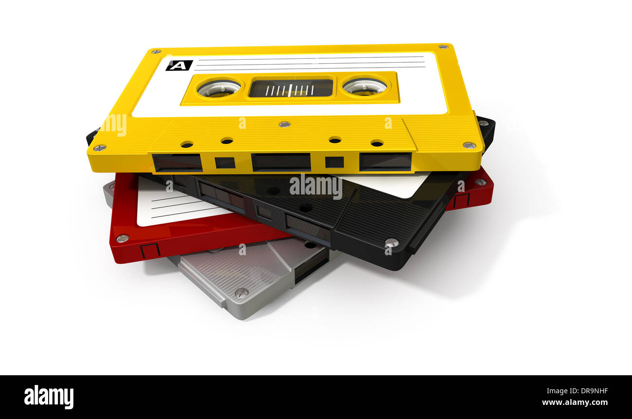 A close up view of a stack of four vintage audio cassette tapes with a labels on an isolated white background Stock Photo