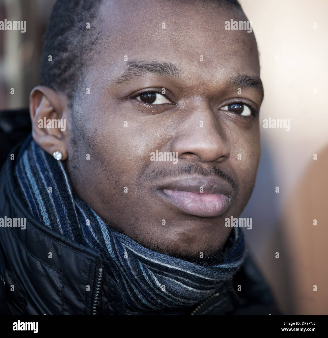 Black guy in winter clothes Stock Photo