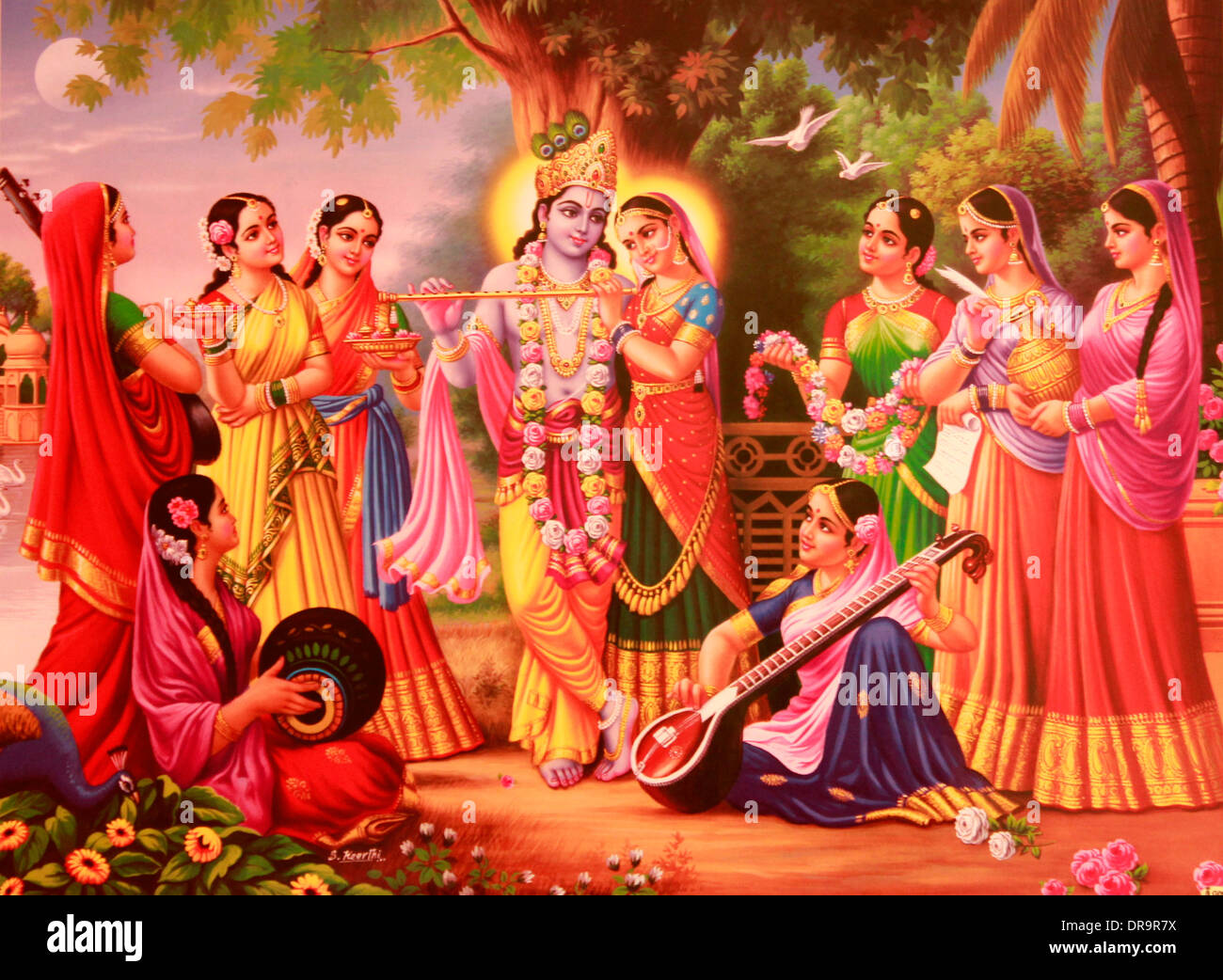 Depiction of hindu god krishna with Radha and gopis Stock Photo