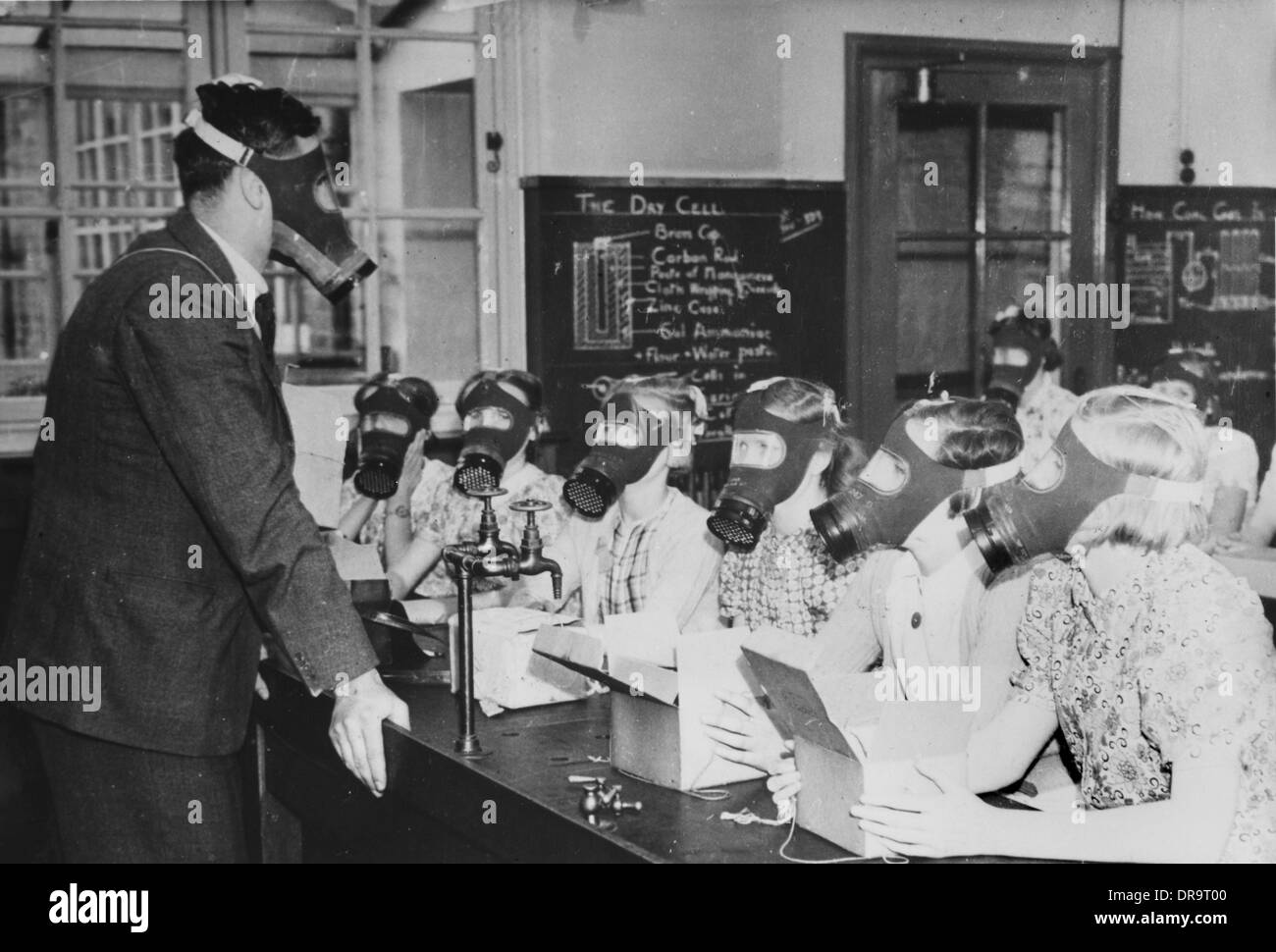 Gas Mask drill at school, 1939 Stock Photo