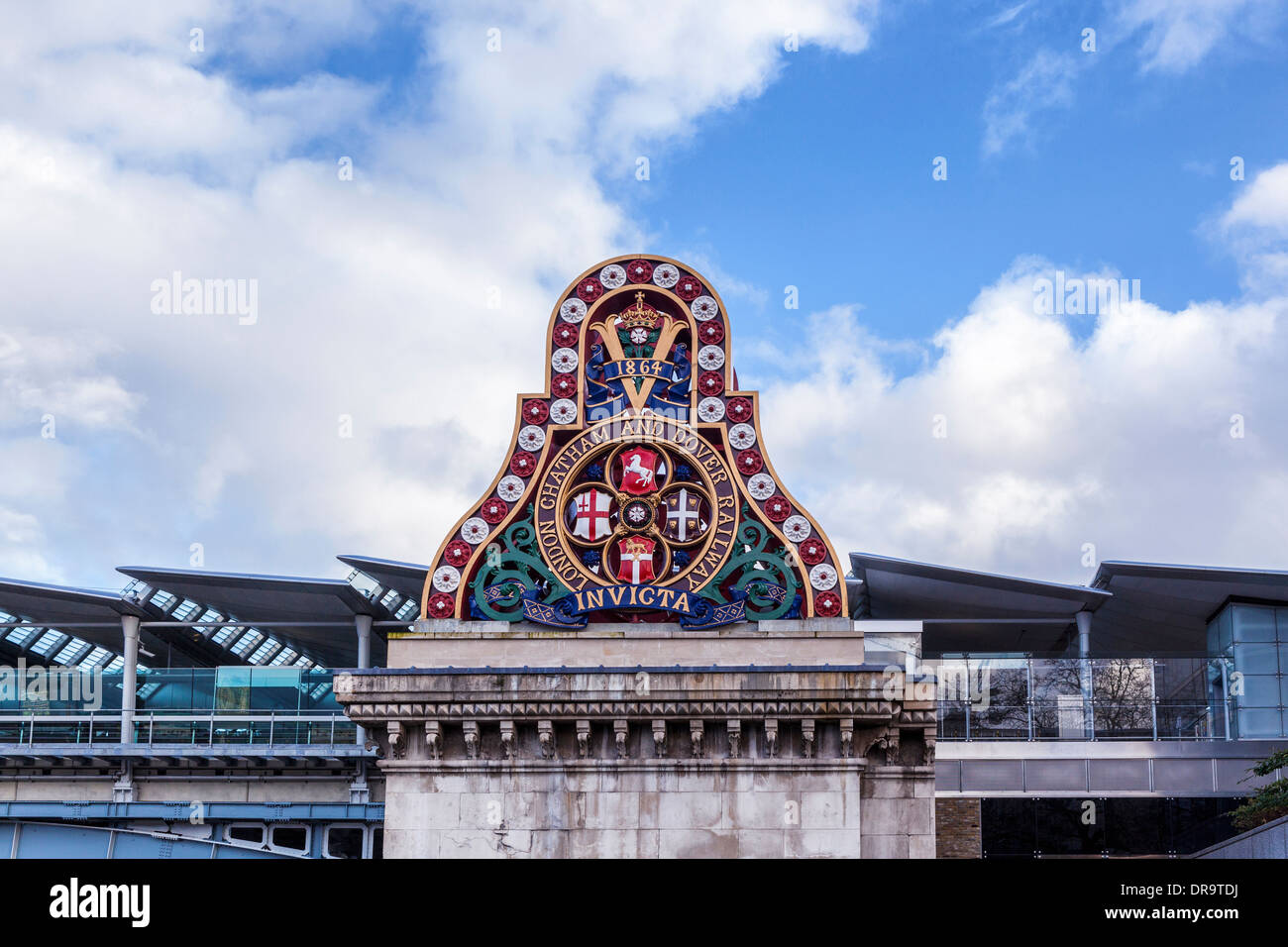 London Chatham and Dover railway crest with Invicta motto and solar panels of Blackfriars railway station, London, UK Stock Photo
