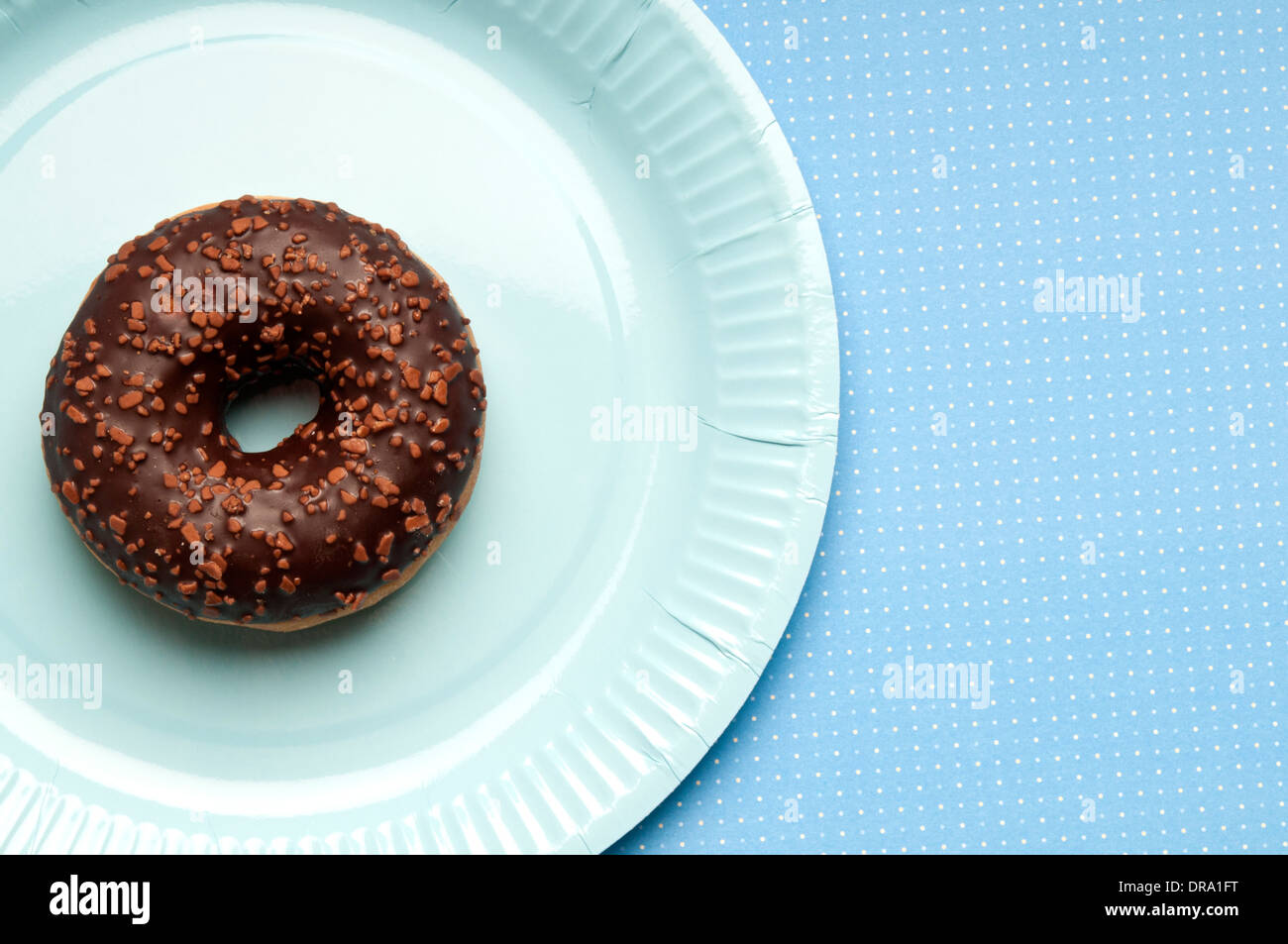 a chocolate frosted doughnut Stock Photo
