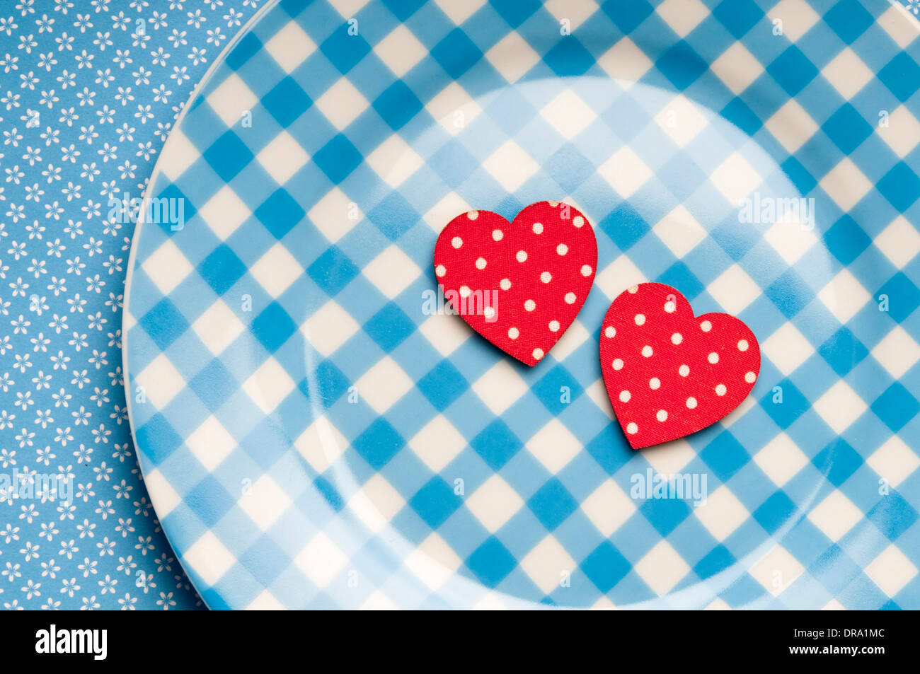 two valentine hearts on a plate. love concept Stock Photo