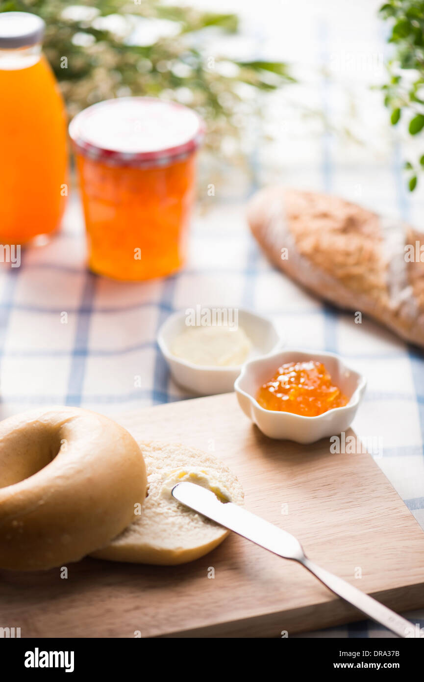 cream cheese spread on top of a bagel Stock Photo Alamy