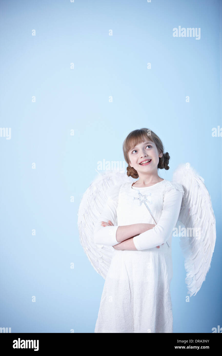 a girl dressed as an angel Stock Photo - Alamy