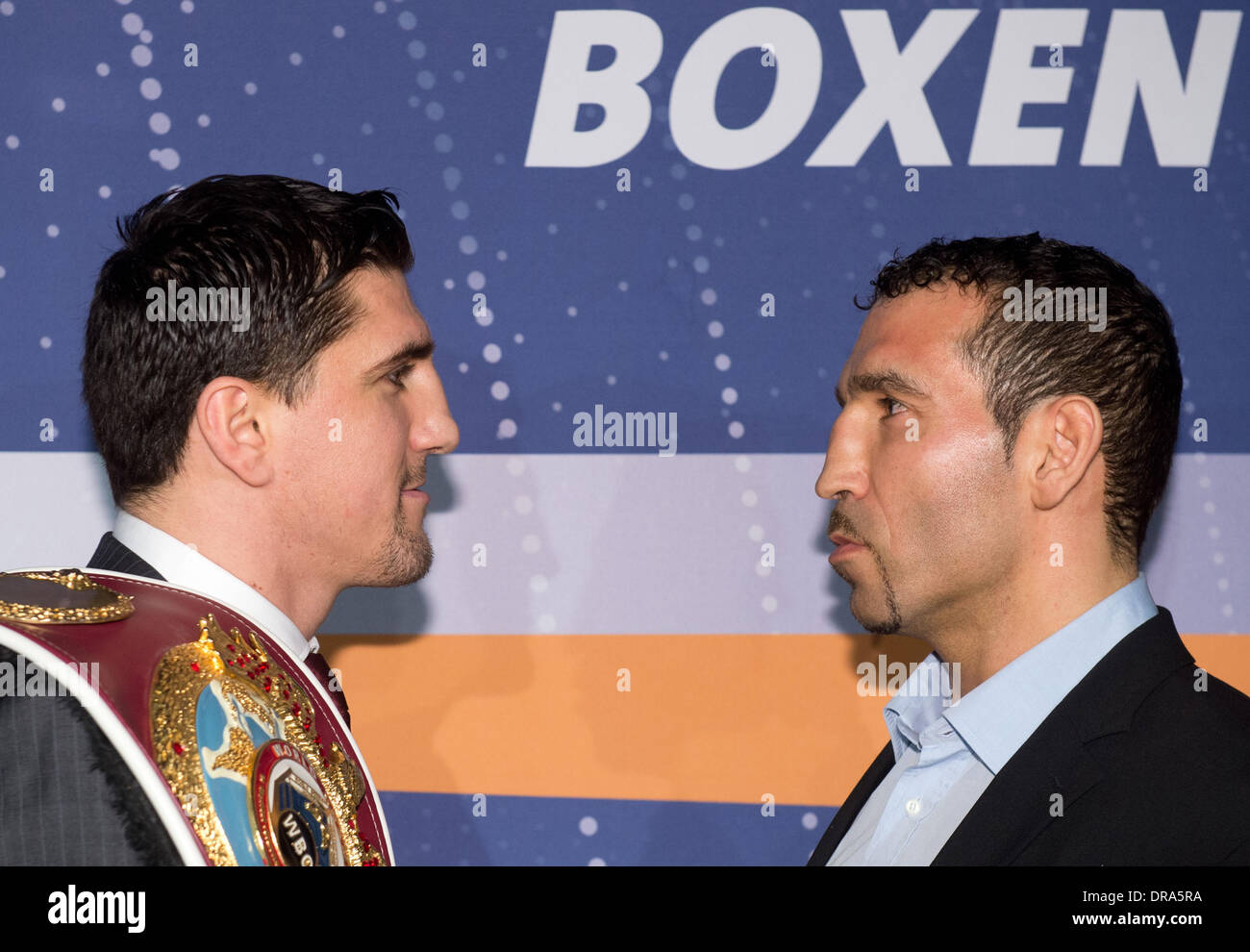 Stuttgart, Germany. 22nd Jan, 2014. German WBO Cruiserweight Champion Marco Huck (L) and his challenger Firat Arslan face off during a press conference in Stuttgart, Germany, 22 January 2014. The WBO Cruiserweight Championship bout will take place on 25 January. Photo: SEBASTIAN KAHNERT/dpa/Alamy Live News Stock Photo