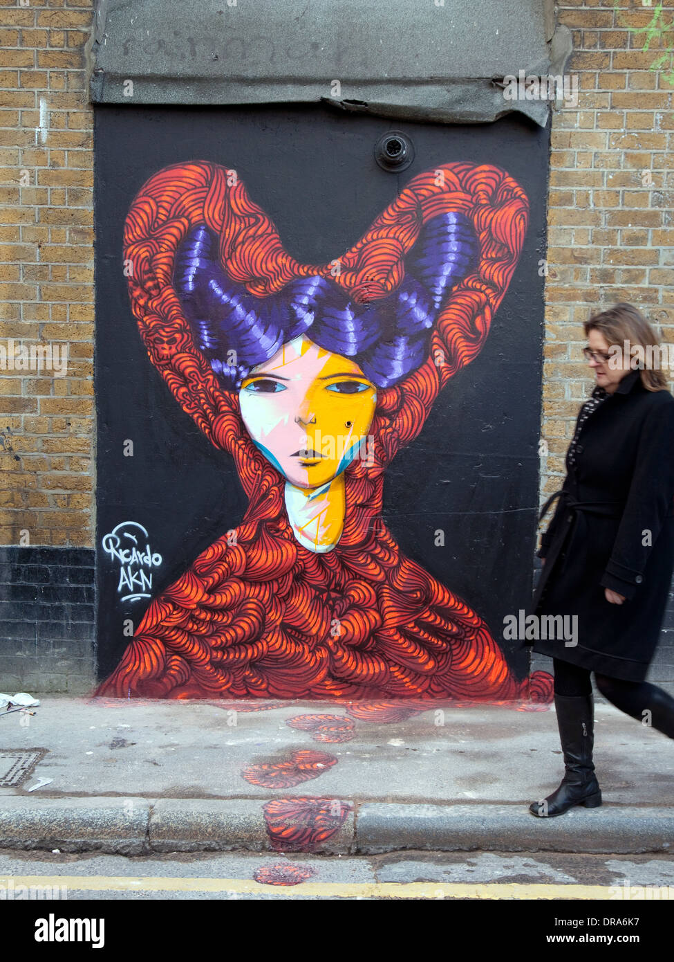 Mural by artist Ricardo Akn in Shoreditch, London Stock Photo