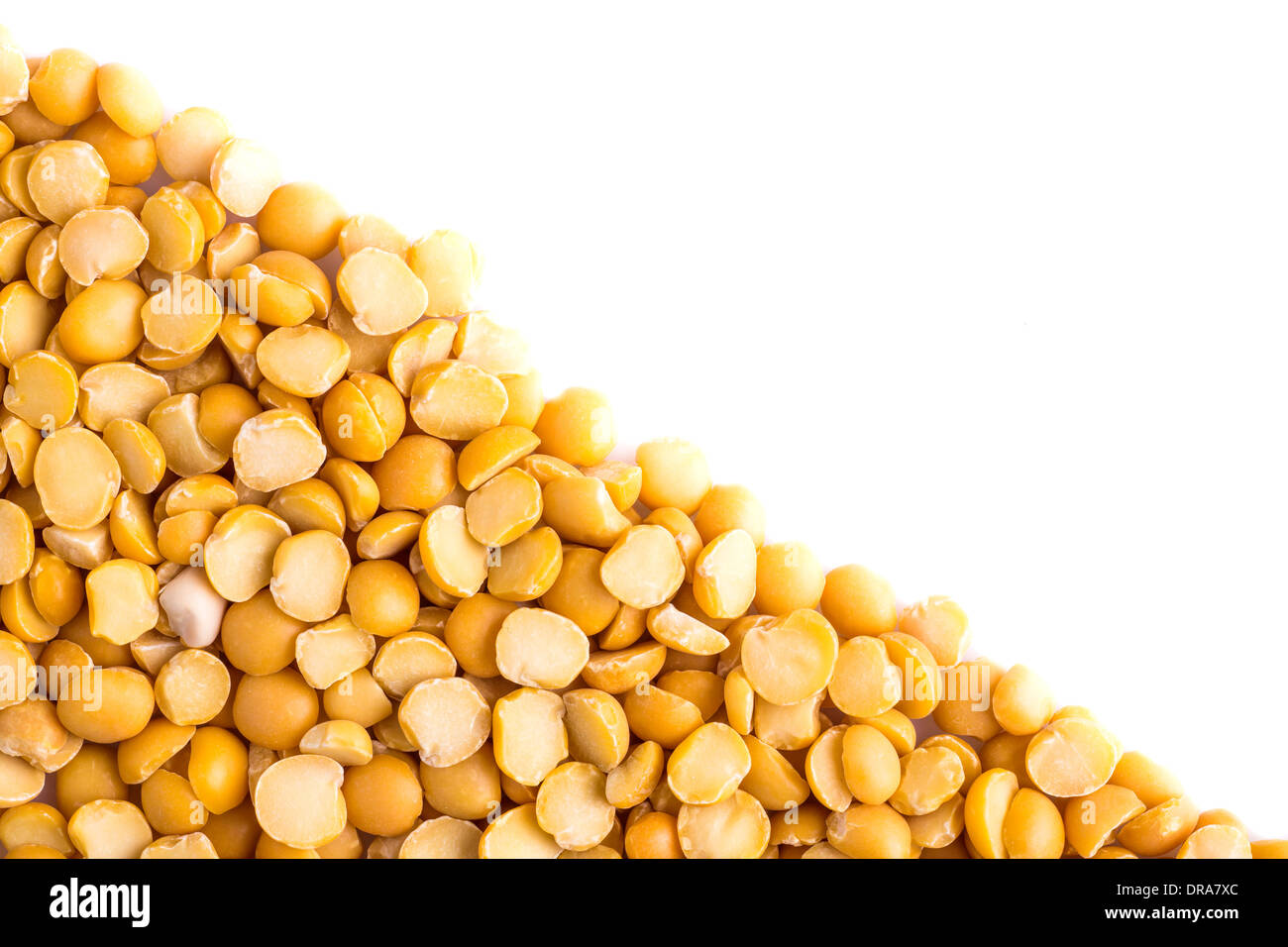 Shredded peas on white background, diagonal split Stock Photo