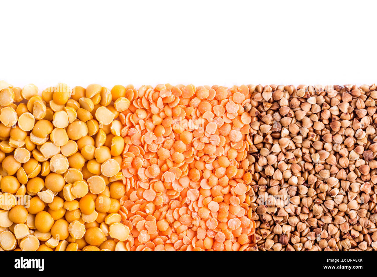 Shredded peas, lentils and buckwheat on white background Stock Photo