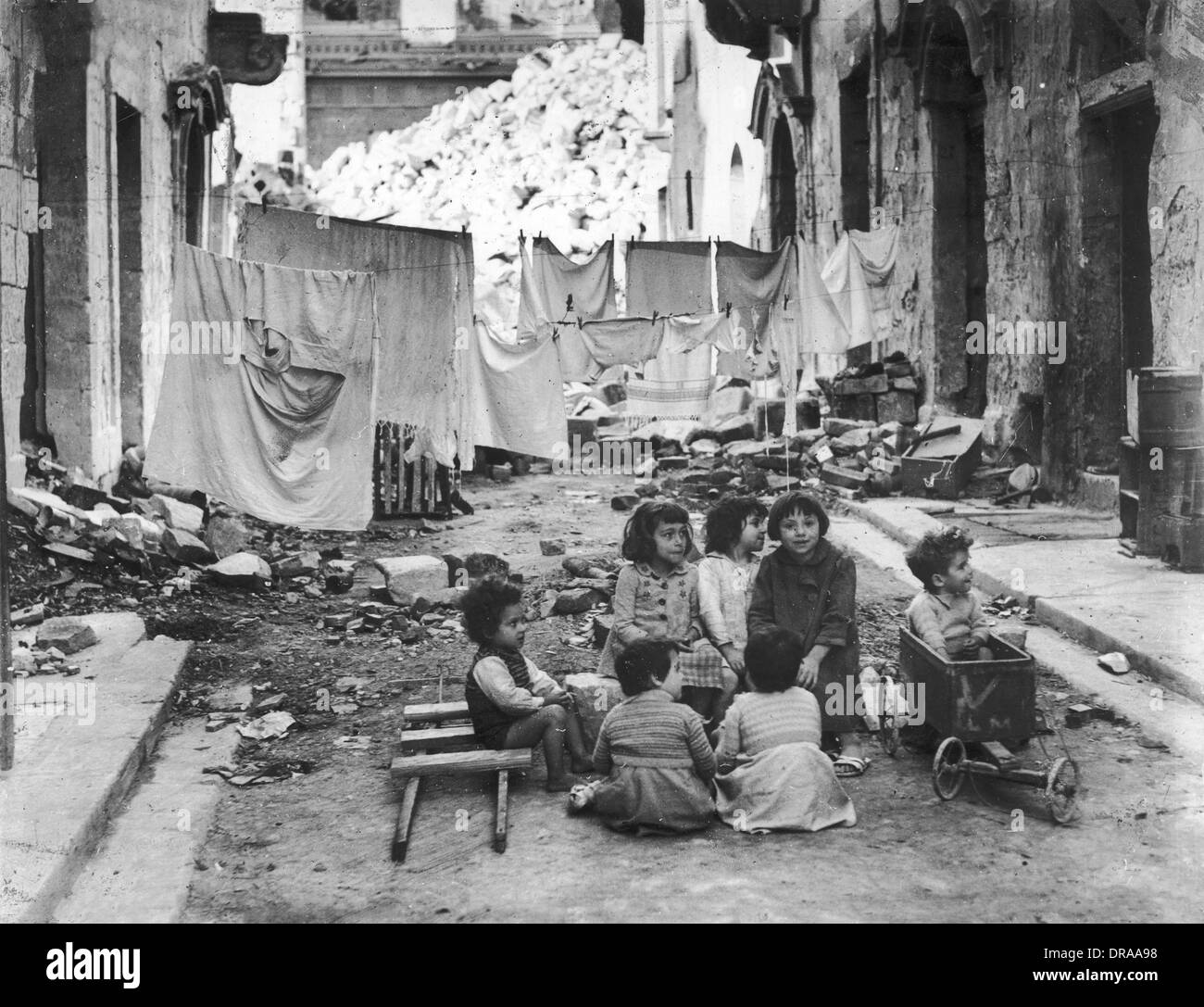 Children in damaged Maltese streets - Malta Stock Photo