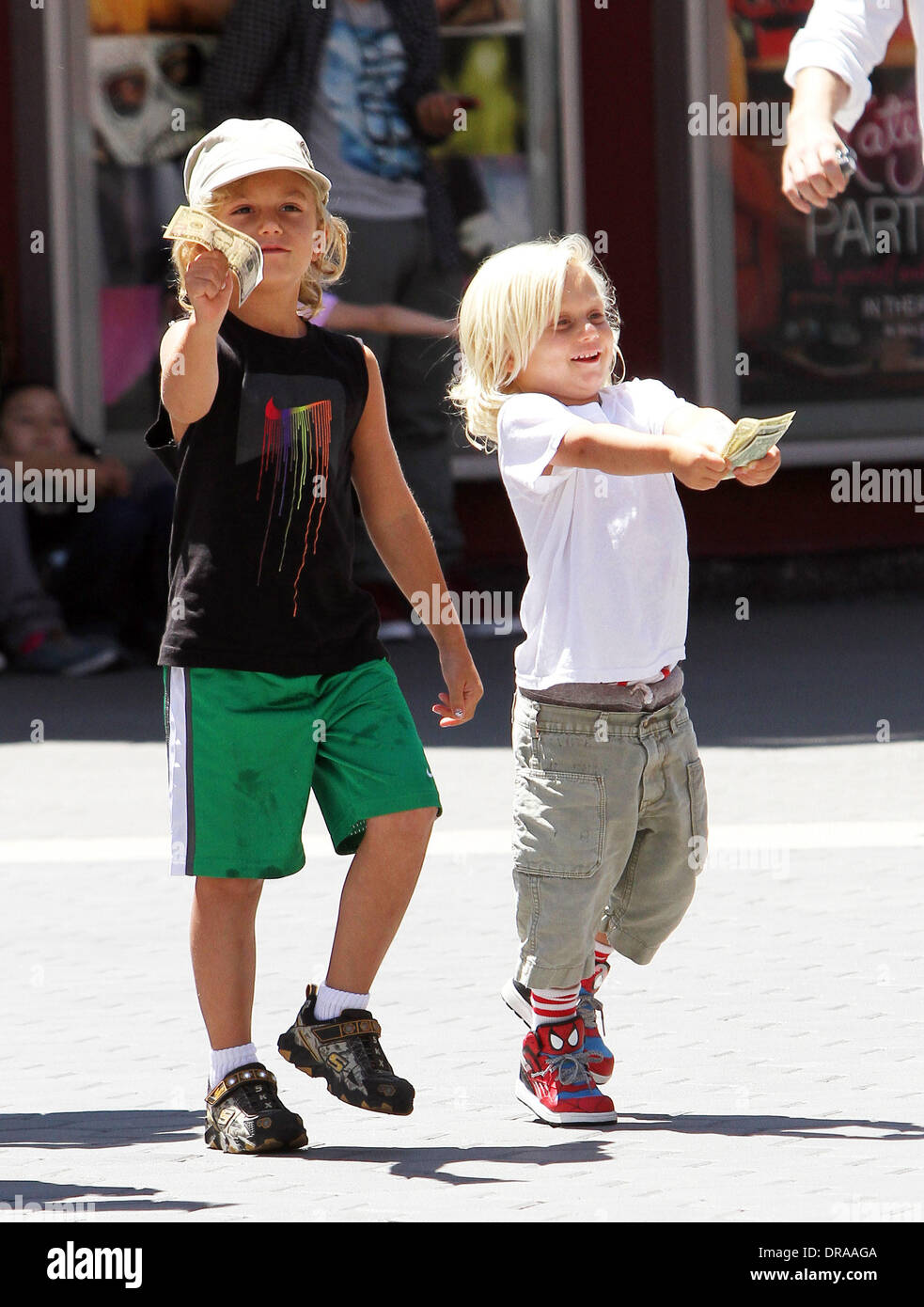 Kingston and Zuma Rossdale put on a cheeky grin as they flash a few(01)
