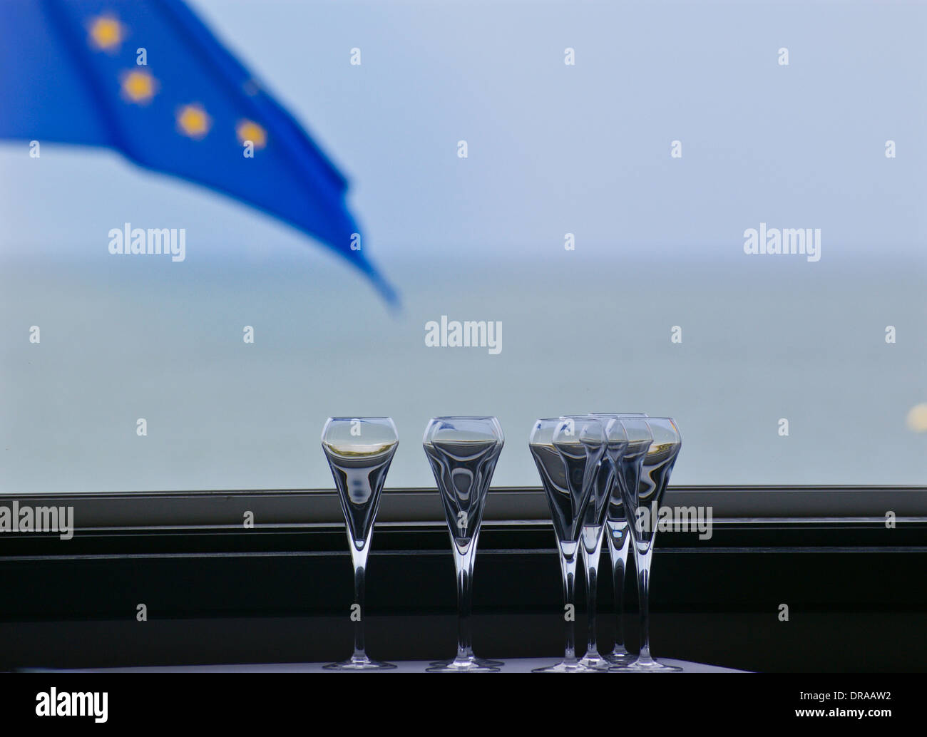 Wine glasses with EU flag through a window, Wimereux, Côte Opale, Nord-Pas-de-Calais, France Stock Photo