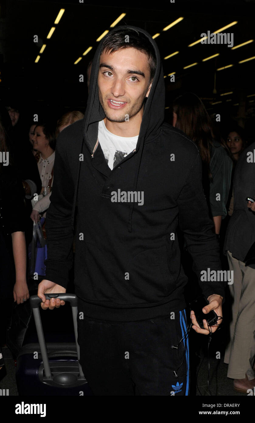 Tom Parker  The Wanted arrive into St. Pancras Eurostar terminal where they are greeted by hoards of adoring female fans all hoping to get up close and chat with the boys. London, England - 04.07.12 Stock Photo