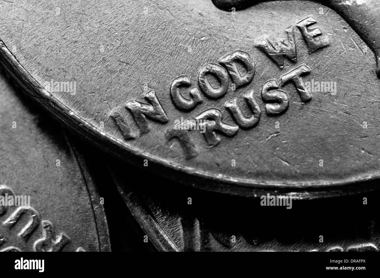 Coins of Silver American Money with words In God We Trust Stock Photo