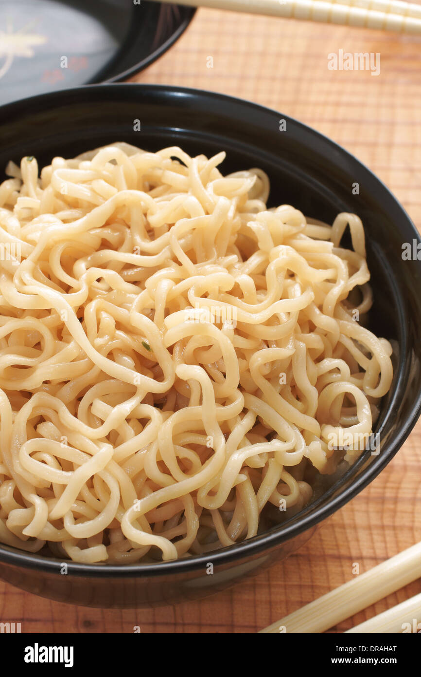 Ramen Noodles in lacquer bowls with chopsticks Stock Photo