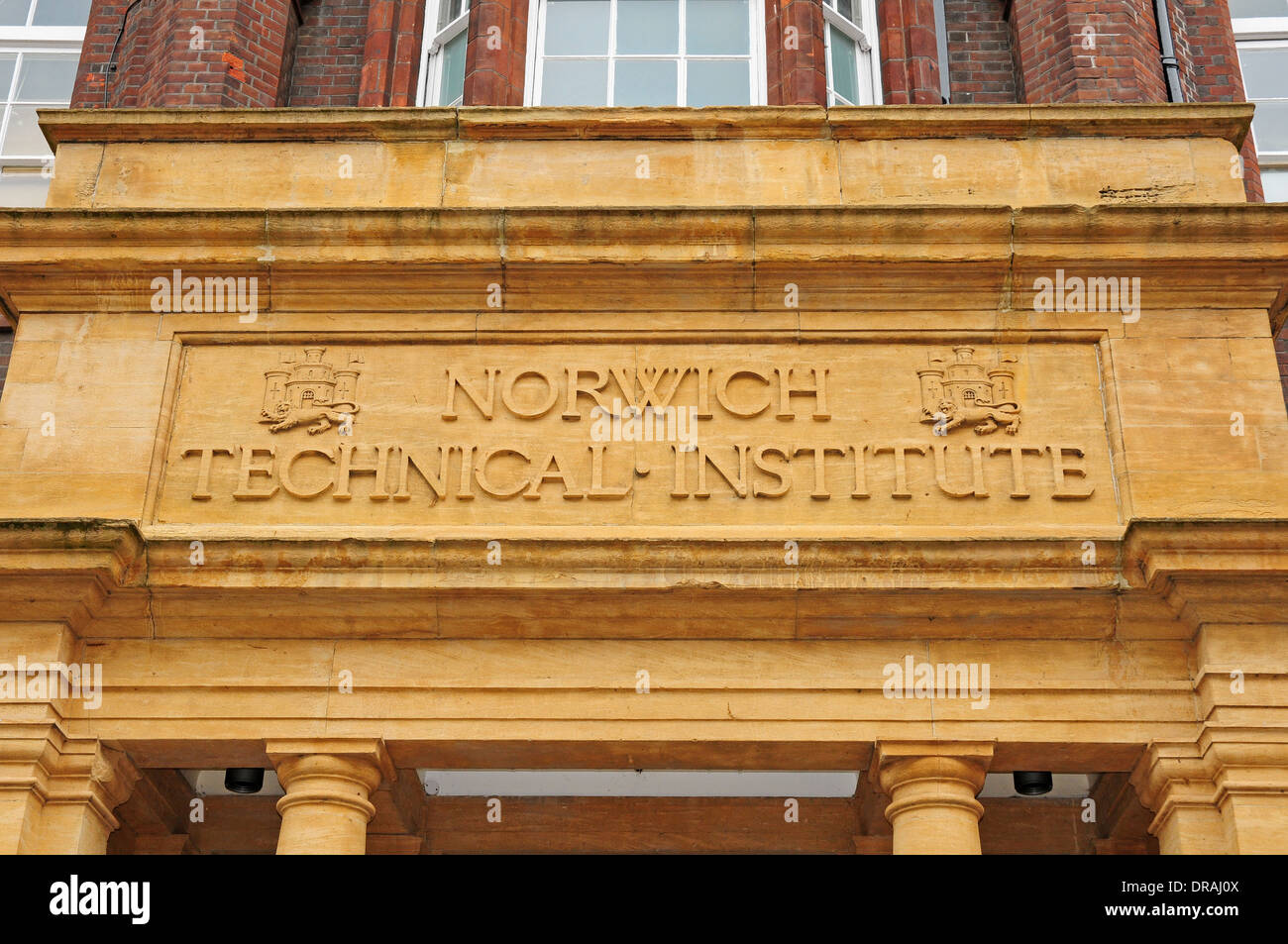 Sculpted sign over the entrance to Norwich Technical Institute. Stock Photo