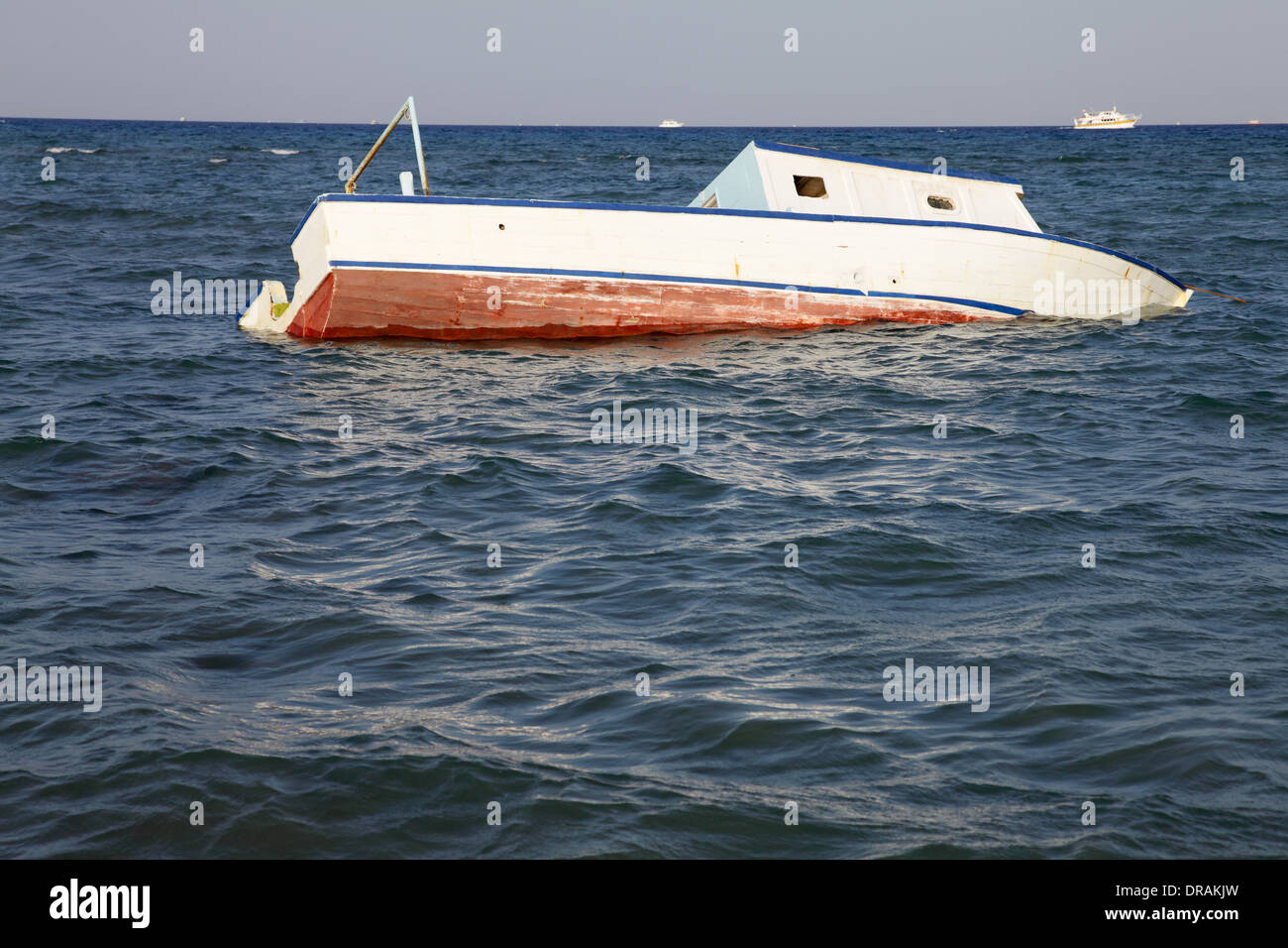 sunken boat in the sea Stock Photo