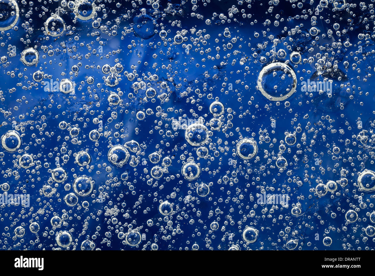 Ice background with bubbles. Natural blue texture of ice Stock Photo