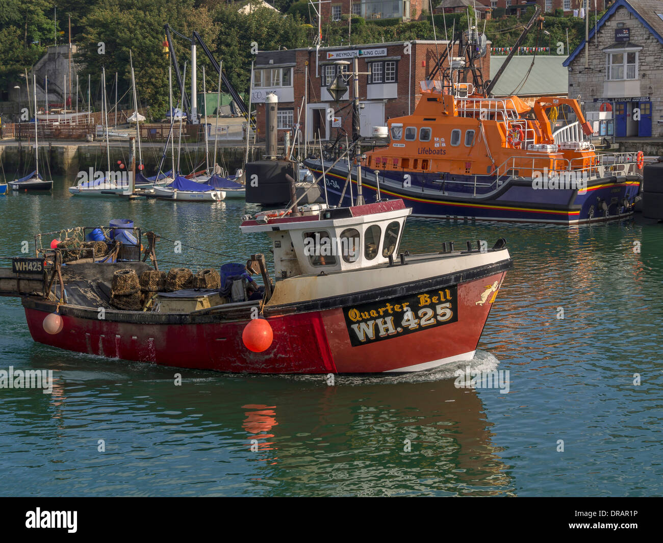 Fishing boat West bay harbour Bridport Dorset UK Stock Photo - Alamy