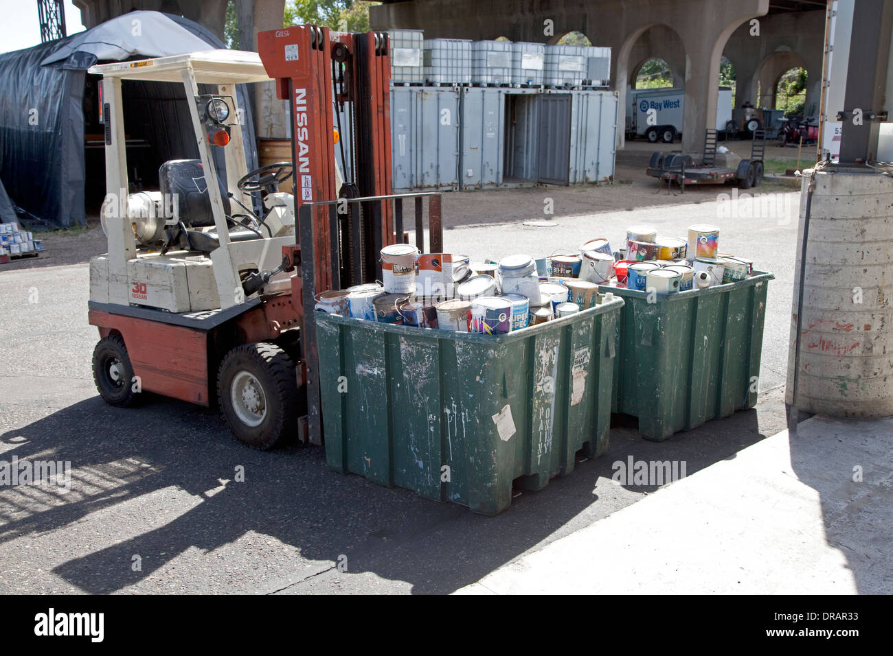 Tubs of paint cans to be recycled at the Household Hazardous Waste