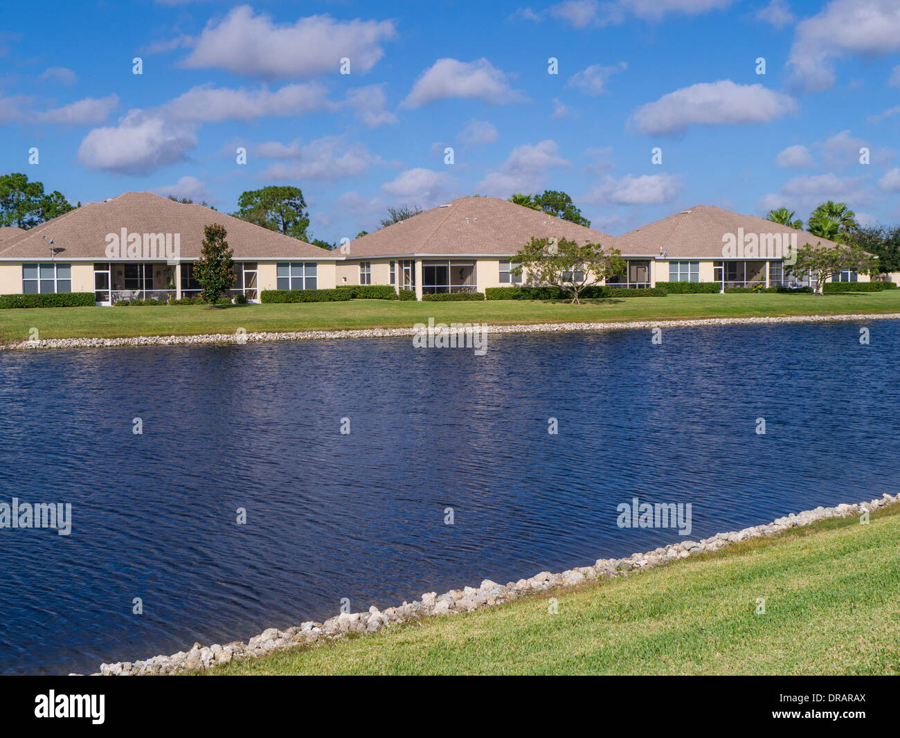 Housing development on lake in community in Florida Stock Photo Alamy