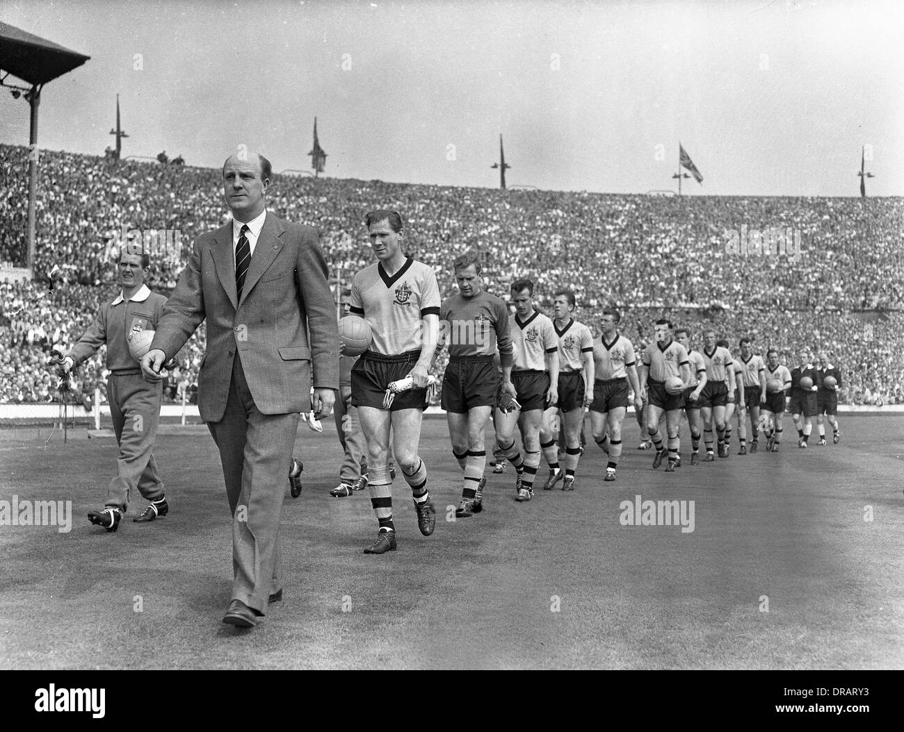 The 1960 FA Cup Final 7th May 1960 Wolverhampton Wanderers manager Stan Cullis followed by Wolves FC captain Bill Slater and Ronnie Clayton of Blackburn Rovers. Wembley Stadium, Britain, Uk Stock Photo