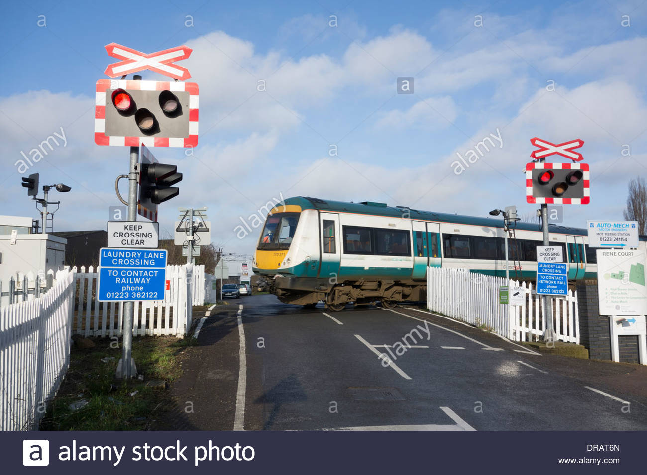 Ungated And Unmanned Level Crossing With Signals And Train Crossing In Cambridge England Uk Stock Photo Alamy