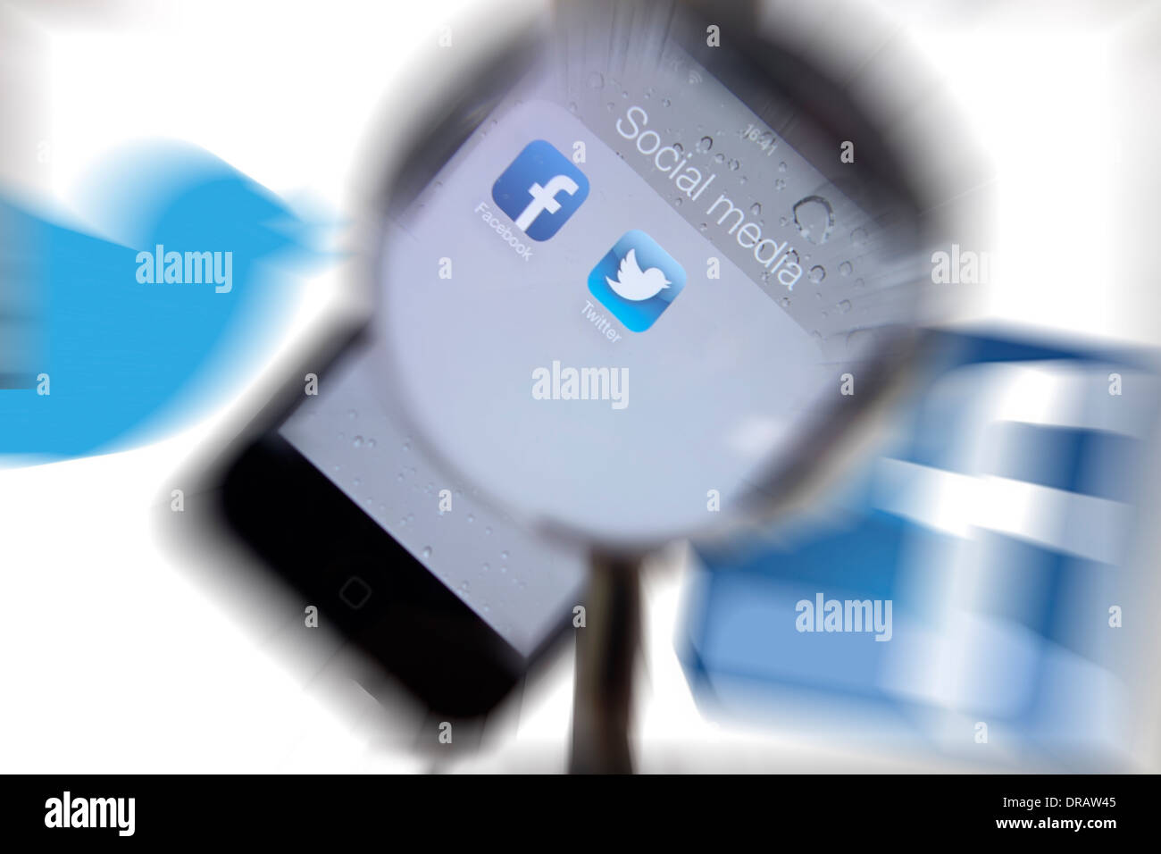 social media twitter facebook on iphone Stock Photo