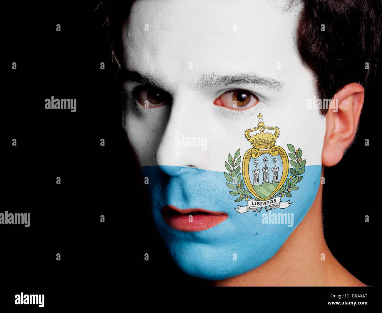 Flag Of San Marino Painted On A Face Of A Young Man Stock Photo Alamy