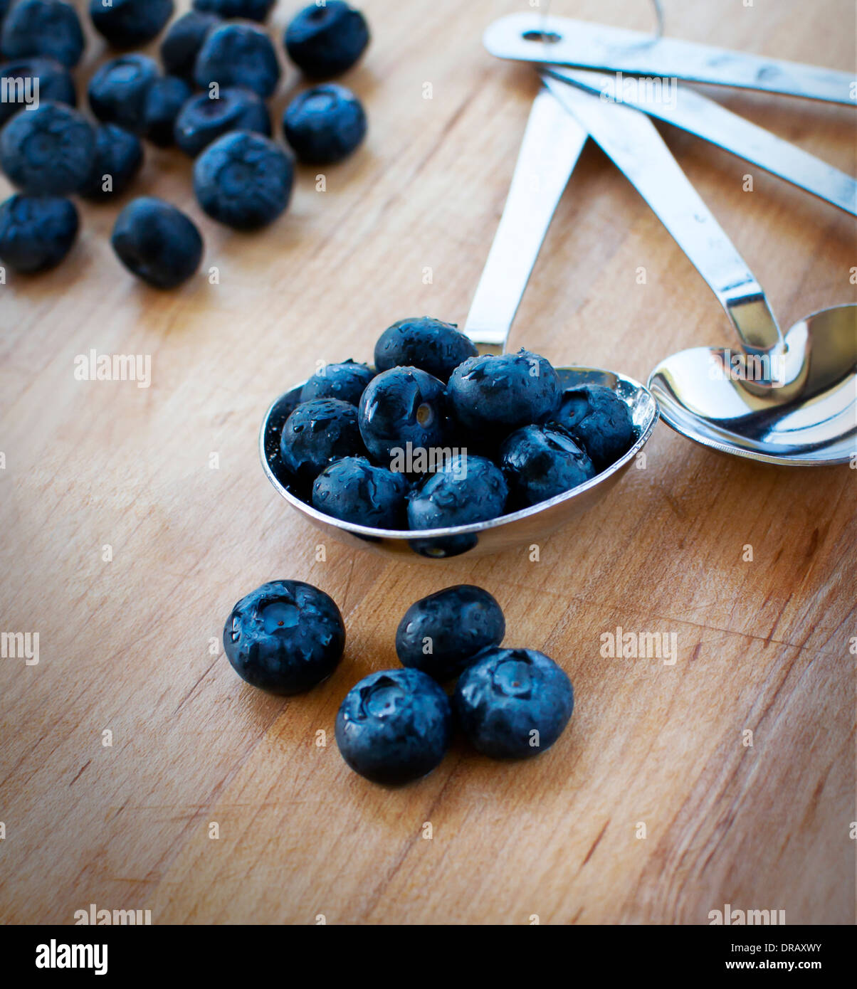 Tablespoon full of blueberries Stock Photo