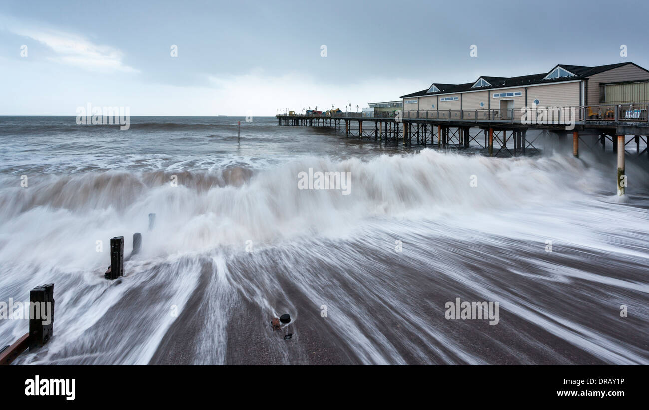Waves breaking in high seas at Teignmouth Pier, Devon Stock Photo