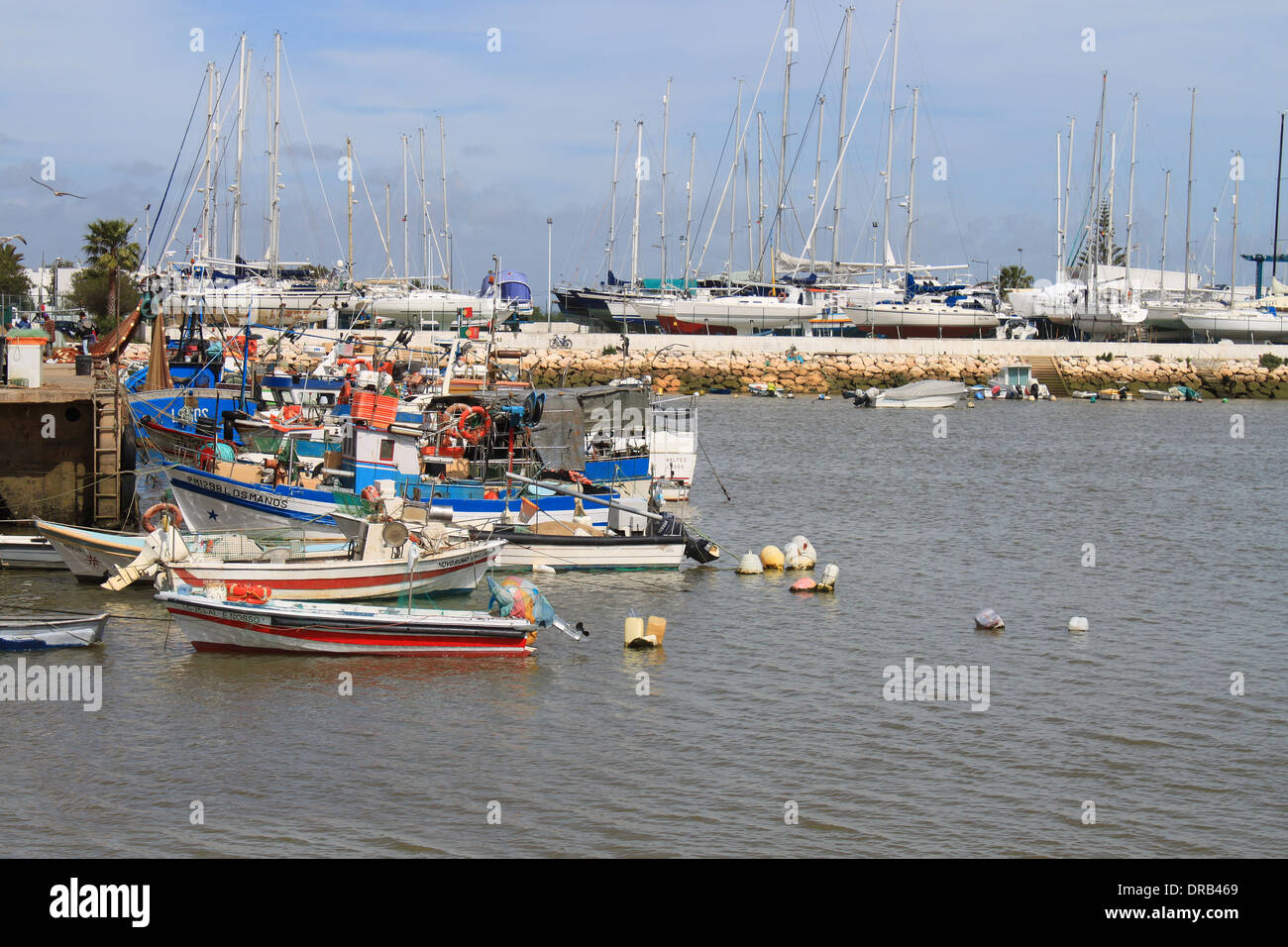LAGOS,PORTUGAL,MARCH 21,2013: Motorboats and sailboats docked in the marina of Lagos, Algarve, Portugal, on March 21, 2013 Stock Photo