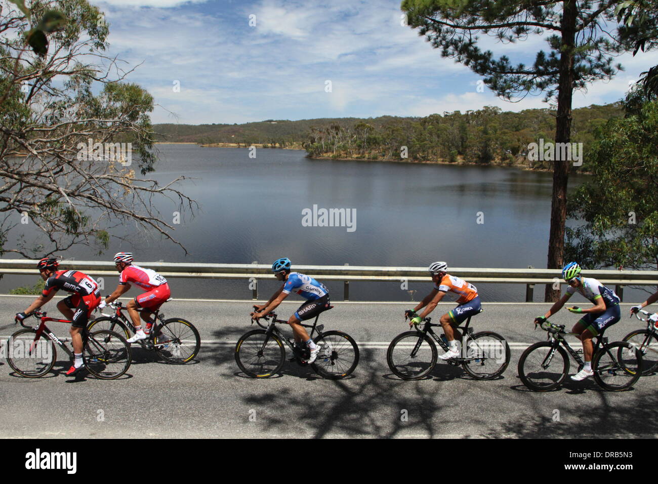 South Australia. 23rd Jan, 2014. Simon Gerrans (Orica Greenedge) wearing the Ochre leaders jersey with a picturesque backdrop of Chain of Ponds in Stage 3 of the Santos Tour Down Under 2014 from Norwood to Campbelltown, South Australia on 23 January 2014 Credit:  Peter Mundy/Alamy Live News Stock Photo
