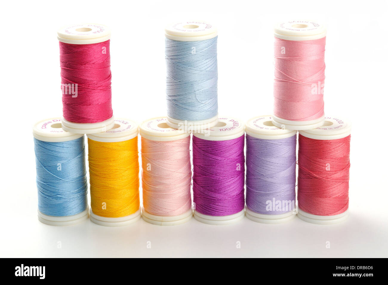 Coloured threads by Drima on neutral background Stock Photo