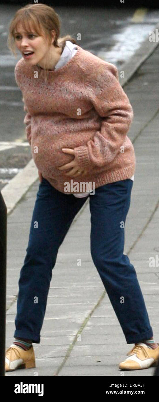 Rachel McAdams films a scene where she goes into labour on the famous Abbey Road zebra crossing  on the set of 'About Time', on location in London. Rachel McAdams plays pregnant Mary and Domhnall Gleeson is cast as time-traveller Tim in the new Richard Curtis film. London, England - 08.07.12 Stock Photo