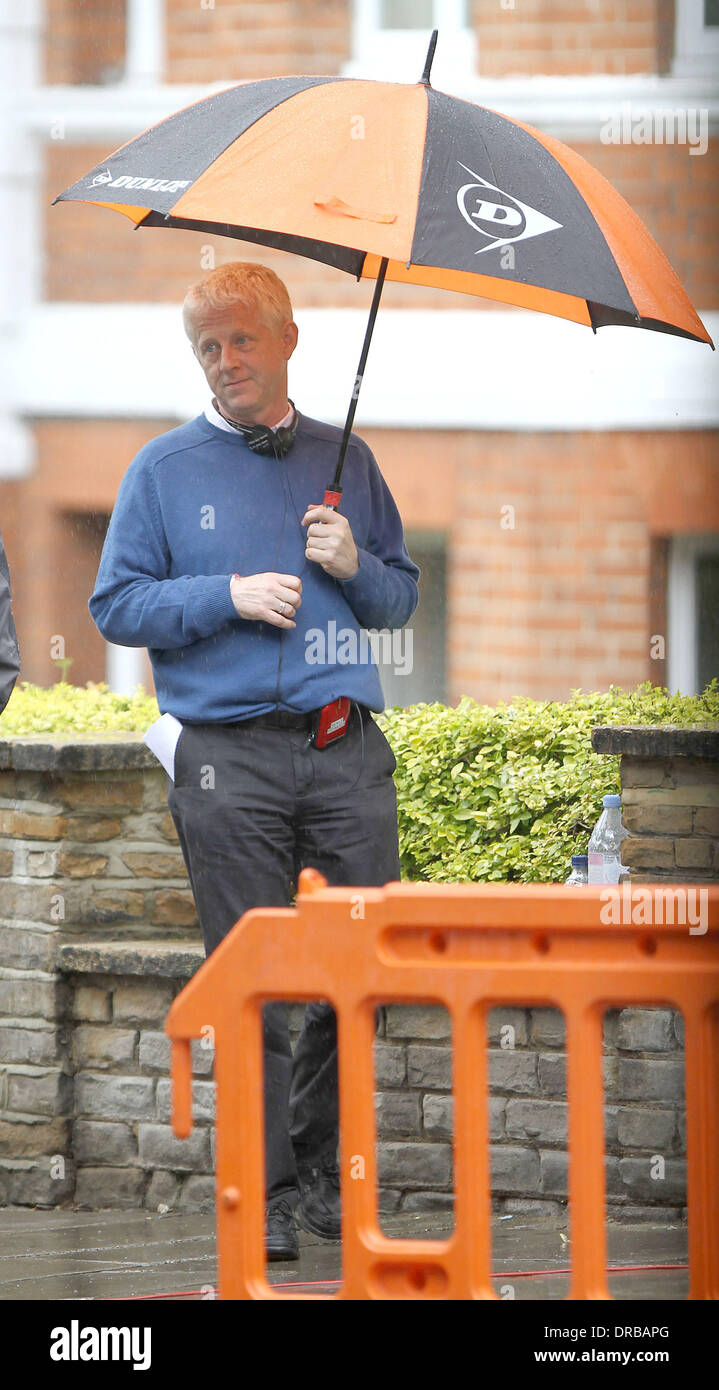 Director Richard Curtis  on the set of 'About Time', on location in London. Rachel McAdams plays pregnant Mary and Domhnall Gleeson is cast as time-traveller Tim in the new Richard Curtis film. London, England - 08.07.12 Stock Photo