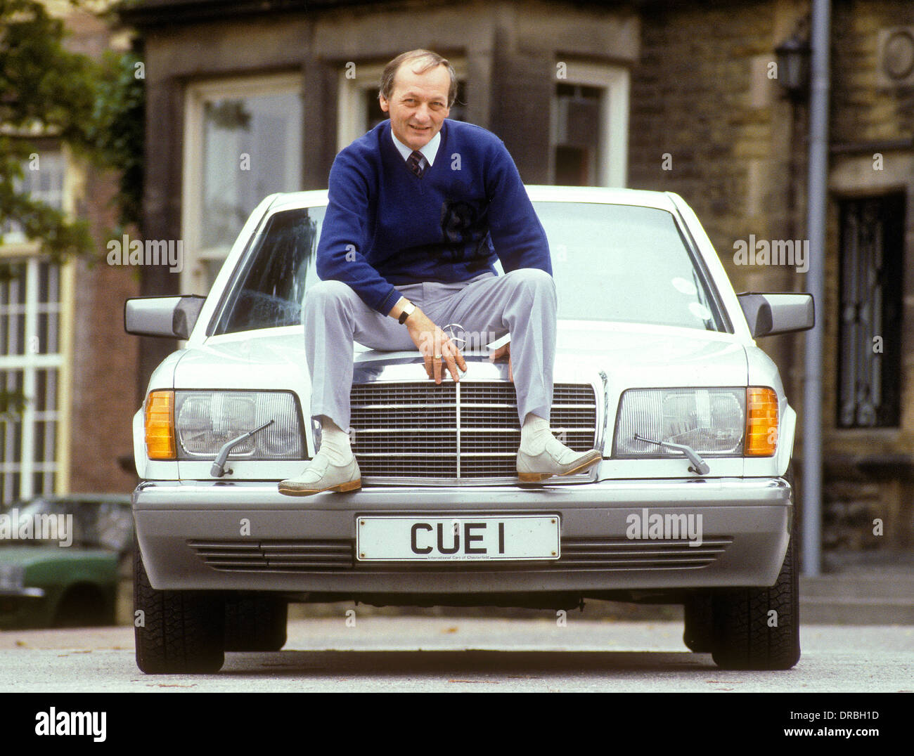 Snooker promoter mike watterson and his cue 1 car plate in the early