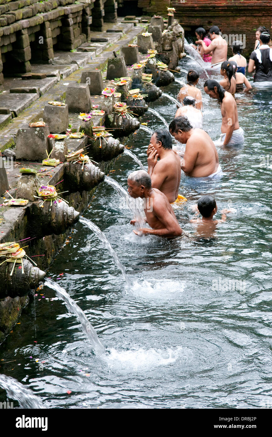 People bathing in holy bath, Bali, Indonesia Stock Photo