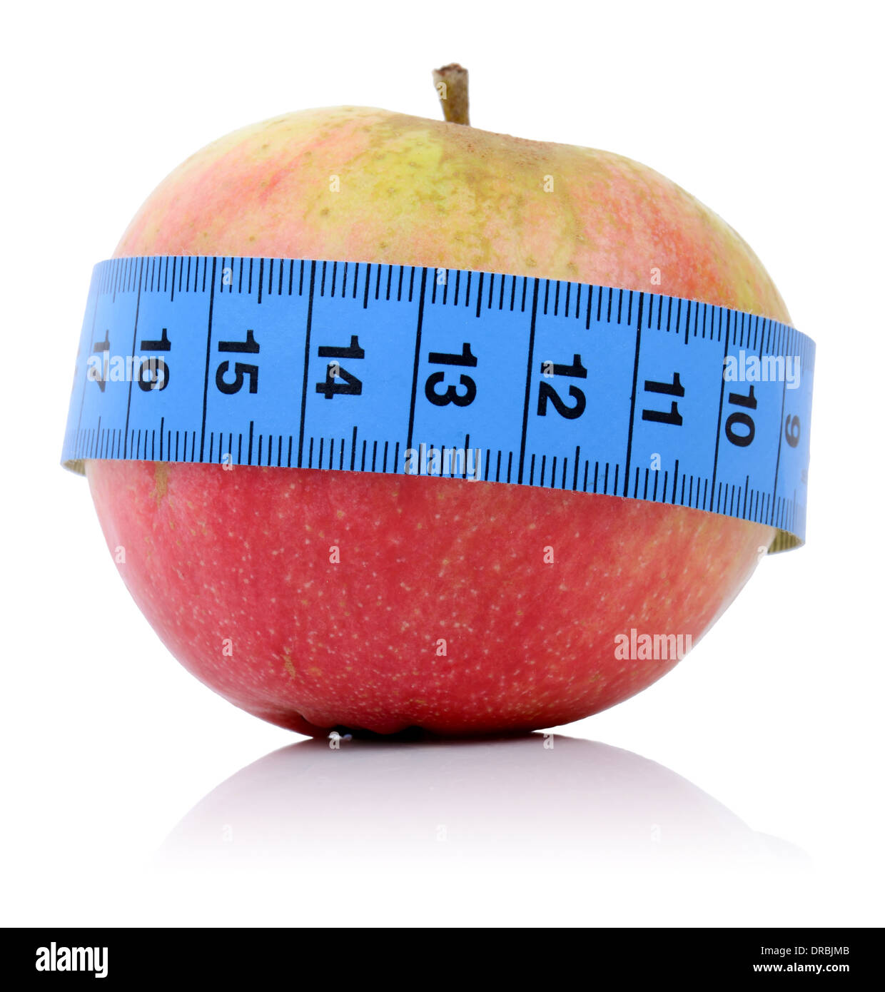 concept for healthy eating and dieting an apple with a tape measure isolated on a white background Stock Photo