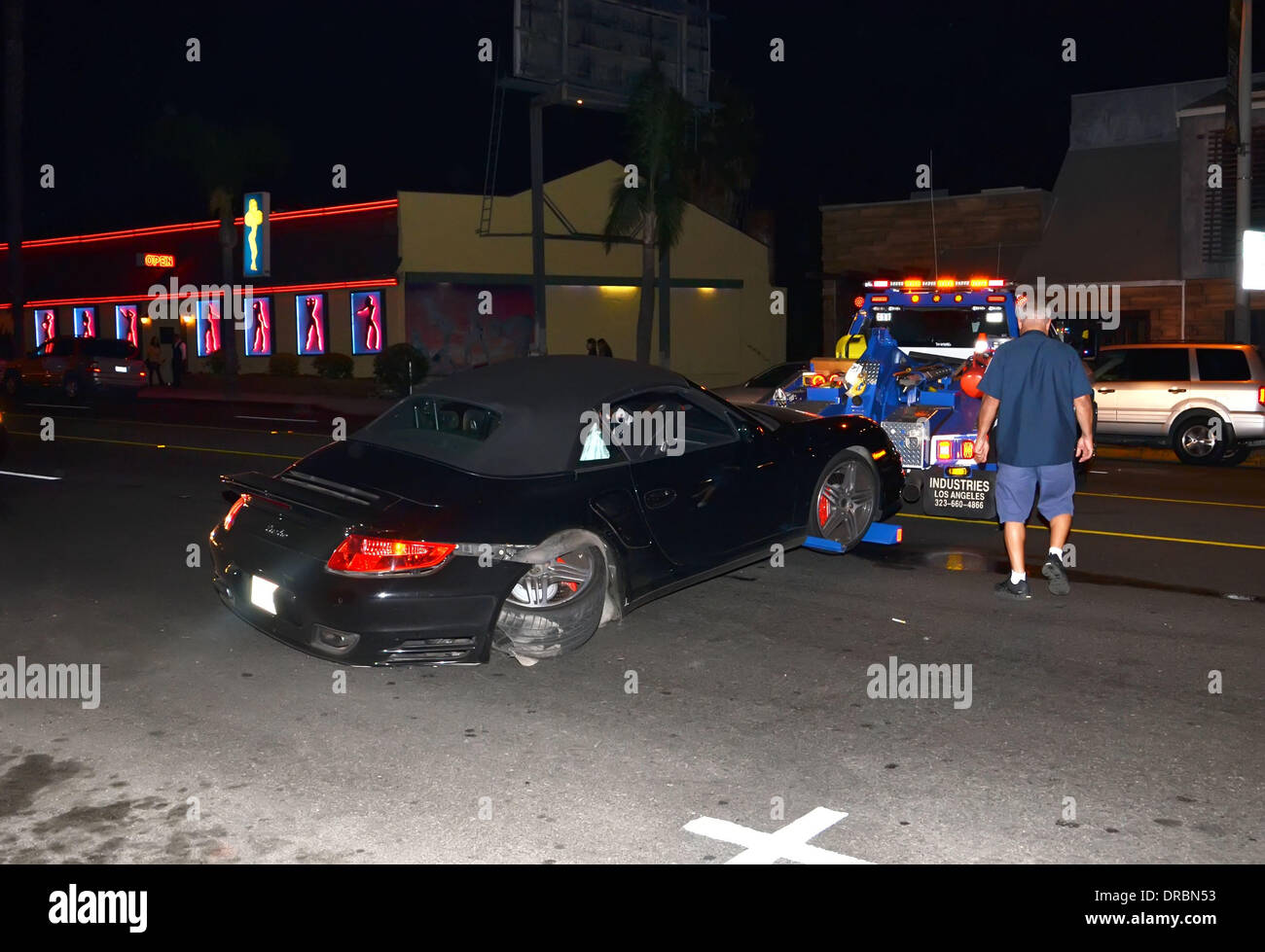 Singer Robin Thicke gets a ride from cops in Los Angeles after his