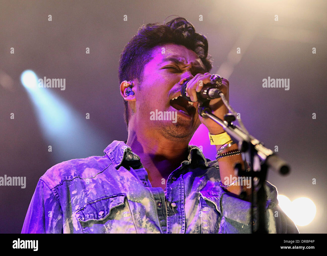 Mandagi Lead singer Dougy Mandagi of Temper Trap performing on stage in the ...
