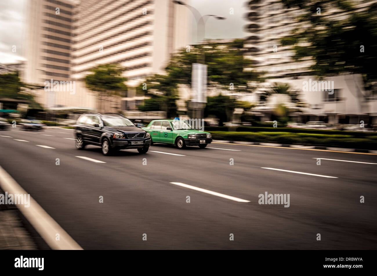 Blurred Singapore taxi Stock Photo