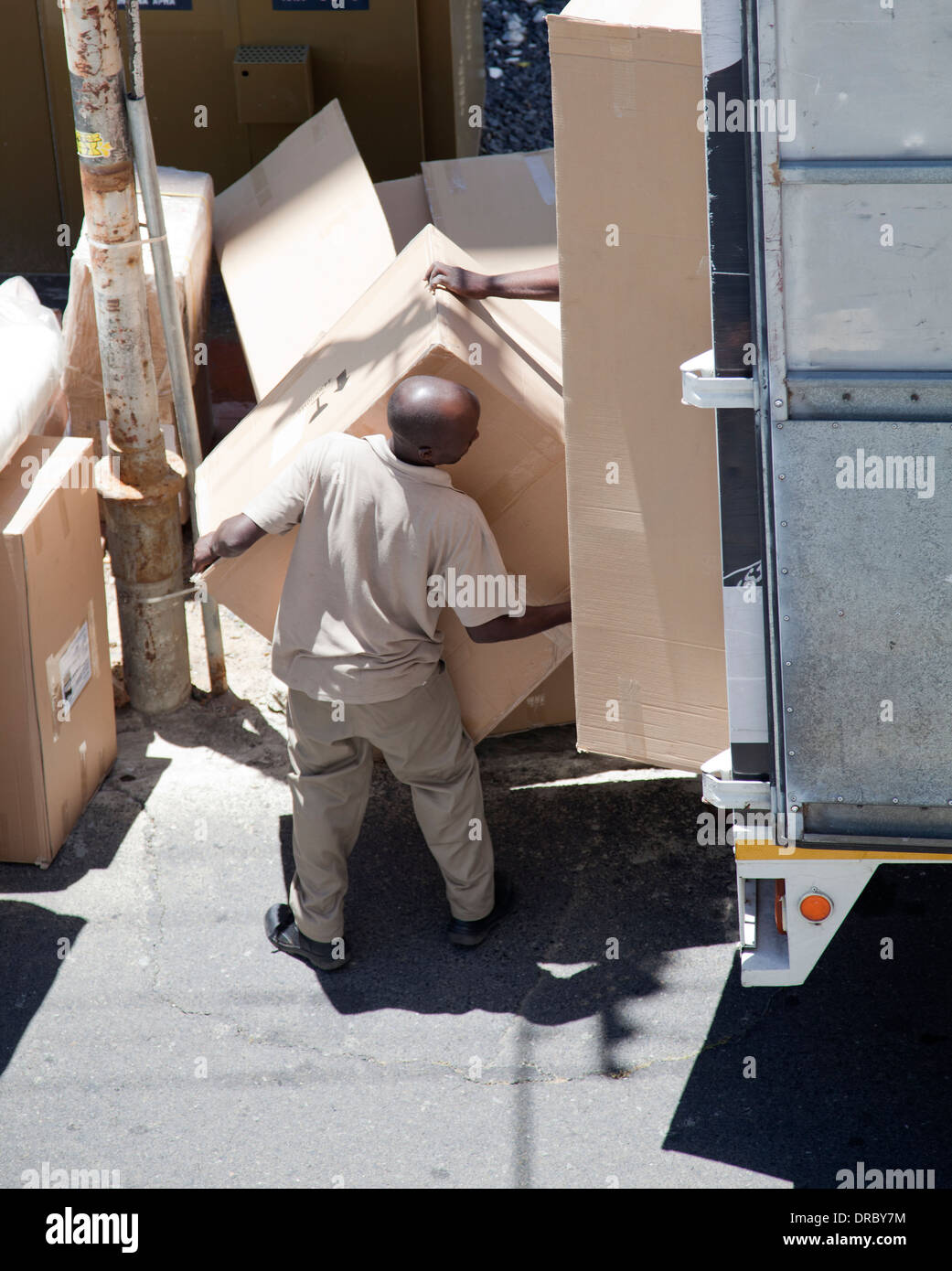 Workers Delivering Packed Furniture in Boxes to Address in cape Town