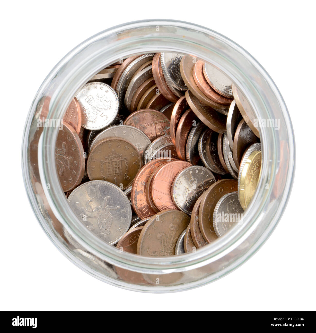 using the rainy day fund, coins spilling out of a jar Stock Photo