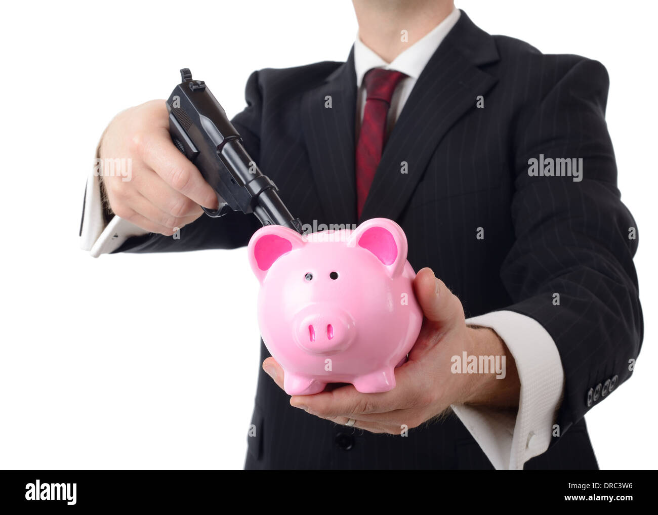 businessman holding bank to ransom with a gun isolated on a white background Stock Photo